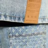 Giacca in denim con effetto consumato al laser