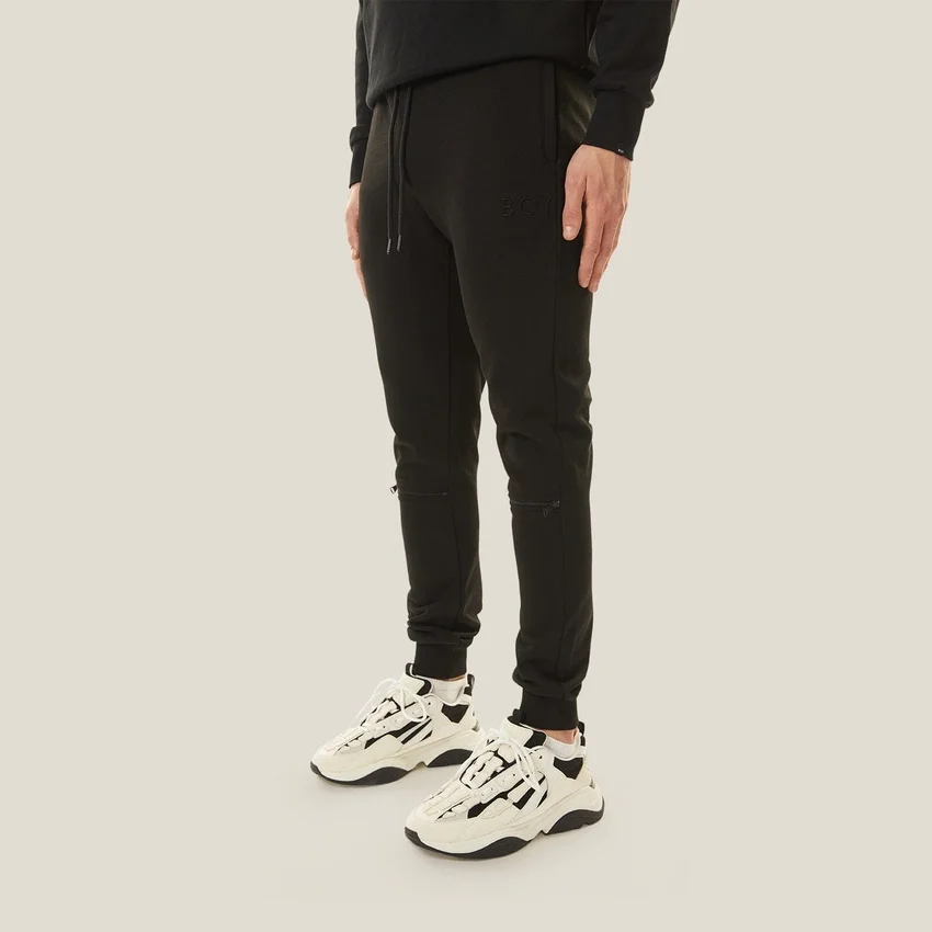 Joggers con zip
