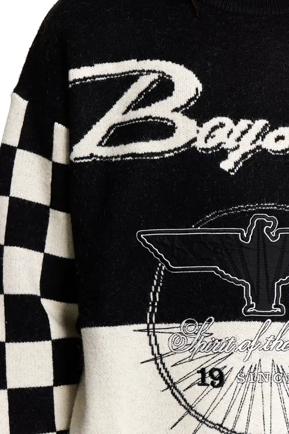 Maglia con maniche a scacchi