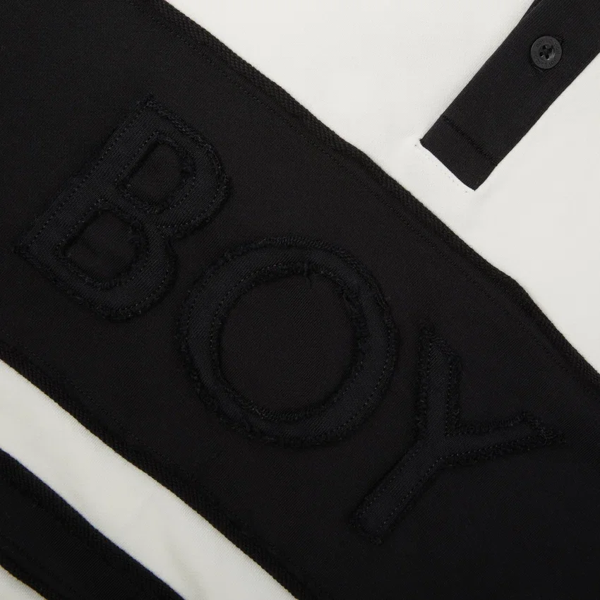 Maglia da rugby a maniche corte con strisce effetto consumato in pantaloncini