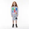 Pantaloncini con badge per bambini