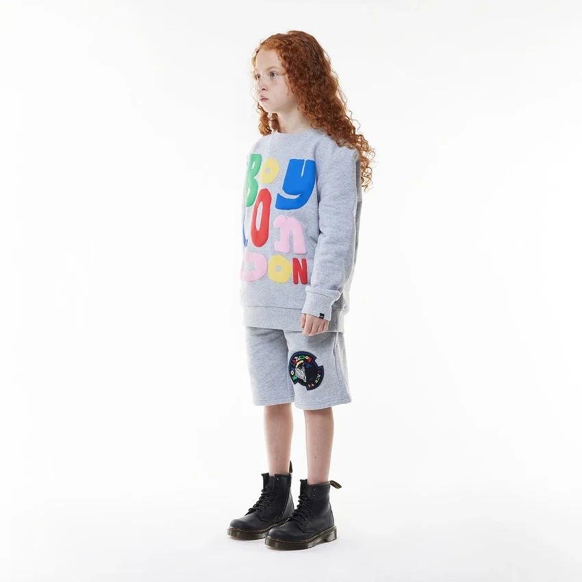 Pantaloncini con badge per bambini
