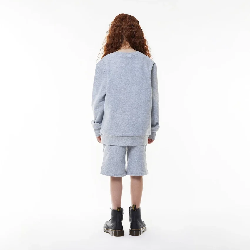 Pantaloncini con badge per bambini