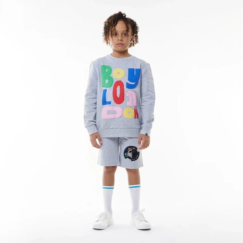 Pantaloncini con badge per bambini