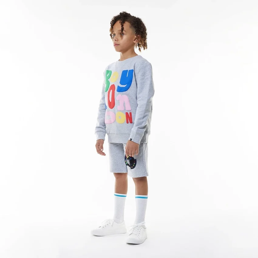 Pantaloncini con badge per bambini