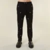 Pantaloni da tuta con occhielli multipli