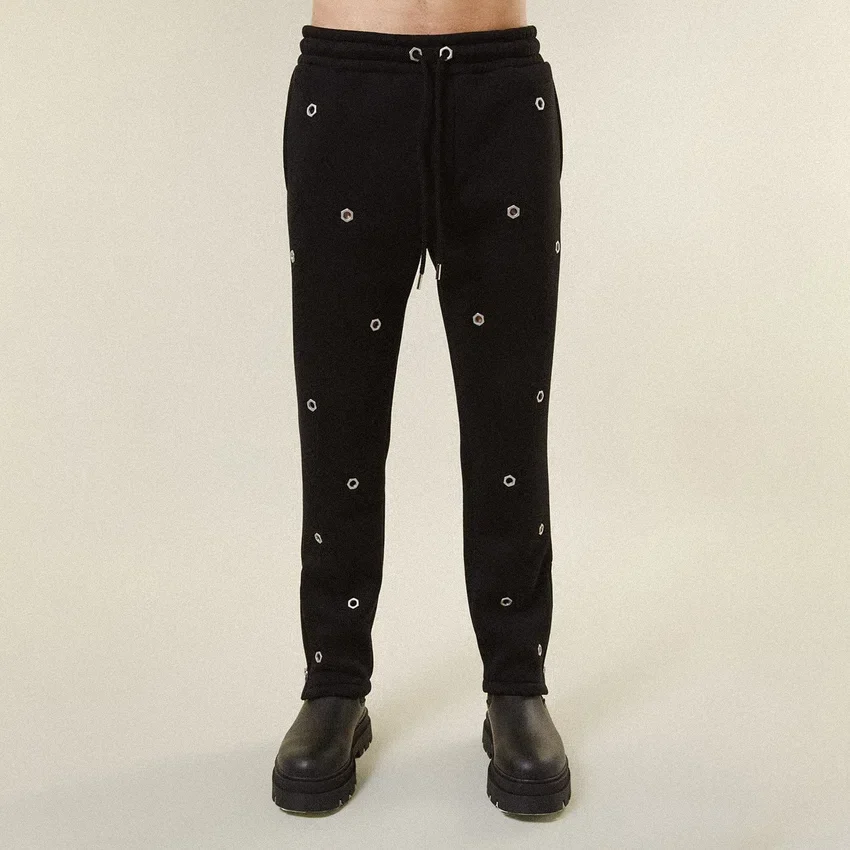 Pantaloni da tuta con occhielli multipli