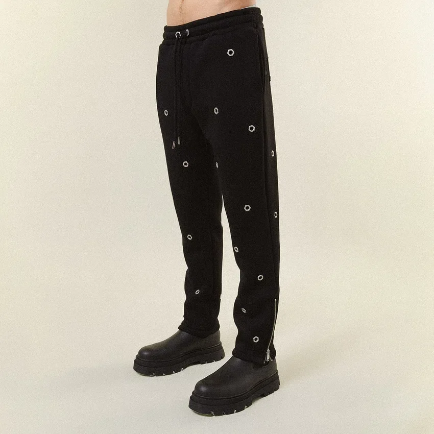 Pantaloni da tuta con occhielli multipli