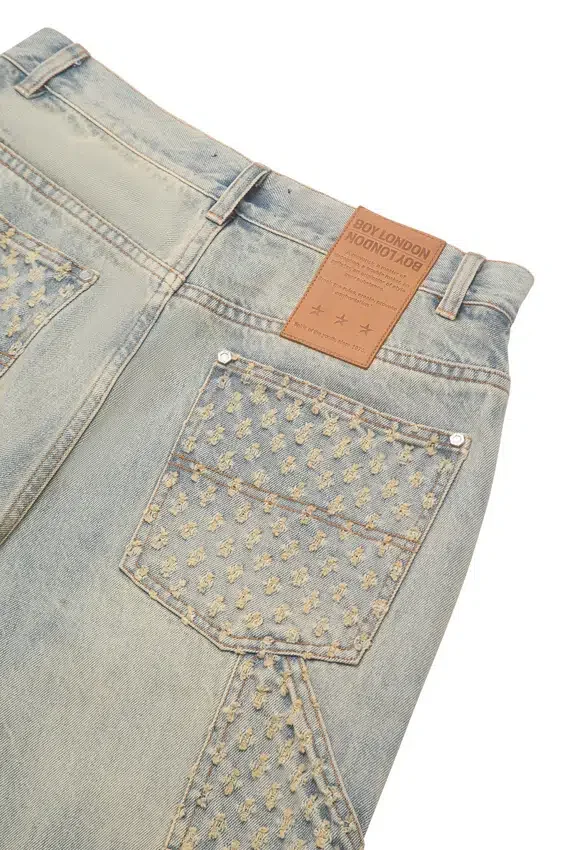 Pantaloni in denim con effetto consumato al laser