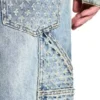 Pantaloni in denim con effetto consumato al laser