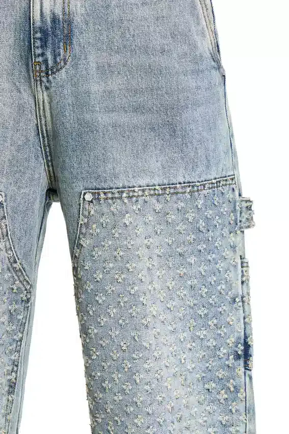 Pantaloni in denim con effetto consumato al laser